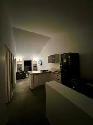 a kitchen with a refrigerator and a counter top at Apartamento en ciudad amurallada centro histórico Cartagena de Indias, Colombia in Cartagena de Indias