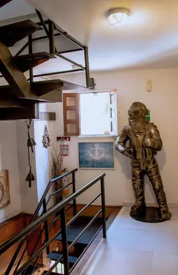 a statue of an astronaut standing in a room at Loft with view 7 rooms in Cartagena de Indias