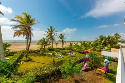a view of the beach from the balcony of a resort at Morros Epic 216 in Cartagena de Indias