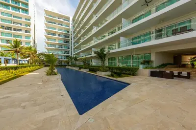 an external view of a building with a swimming pool at Morros Epic 216 in Cartagena de Indias