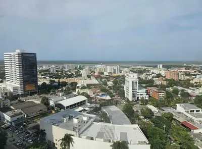 an aerial view of a city with buildings at Apartamento en el Hotel Estelar in Barranquilla