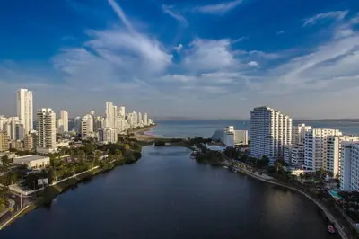 a view of a city with a river and buildings at Apartamento Unik Cartagena Edificio Poseidón in Cartagena de Indias