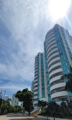 a tall building with trees in front of it at Live Stay - Torres del Lago in Cartagena de Indias