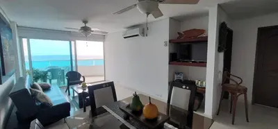 a living room with a view of the ocean at Live Stay - Torres del Lago in Cartagena de Indias