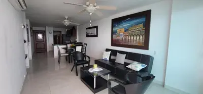 a living room with a couch and a table at Live Stay - Torres del Lago in Cartagena de Indias