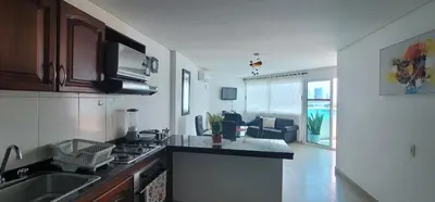 a kitchen with a sink and a counter top at Live Stay - Torres del Lago in Cartagena de Indias