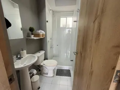 a bathroom with a shower and a toilet and a sink at PISO 19 Mirador Oasis Costero in Cartagena de Indias