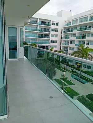 a balcony with a view of a large building at Apartamento en la Boquilla Cartagena in Cartagena de Indias