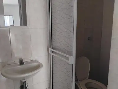 a bathroom with a sink and a toilet at Safarihostal in Cartagena de Indias