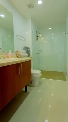 a bathroom with a sink and a toilet and a shower at Apartamento Vista Mar 1604 in Cartagena de Indias