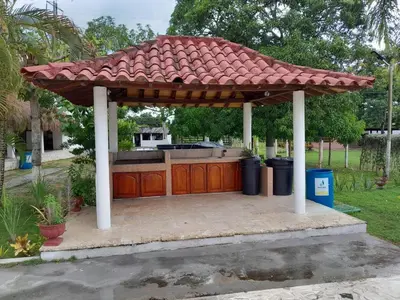 a gazebo with a roof on top of it at Casa Campestre Rancho 75 Eco Park in Arjona