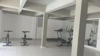 a gym with several exercise bikes in a room at Luxury apartment - Barranquilla 10 minutes to Buenavista in Barranquilla