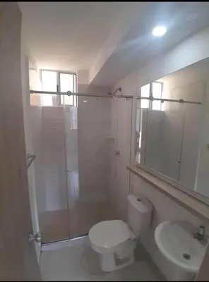 a bathroom with a shower and a toilet and a sink at Luxury apartment - Barranquilla 10 minutes to Buenavista in Barranquilla