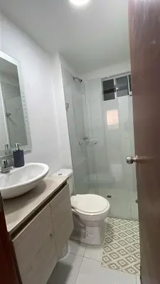a bathroom with a toilet and a sink and a shower at Cozy & Nice Cartagena apartment near to the beach in Cartagena de Indias