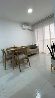 a living room with a table and a couch at Cozy & Nice Cartagena apartment near to the beach in Cartagena de Indias