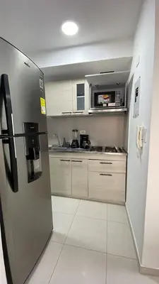 a kitchen with a stainless steel refrigerator at Cozy & Nice Cartagena apartment near to the beach in Cartagena de Indias