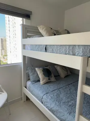 a couple of bunk beds in a room at TorrePRIMI1905 in Cartagena de Indias