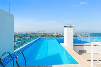 a swimming pool on the roof of a building at Apartamento Marbella Piso 28 - Playa in Cartagena de Indias