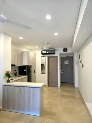a large kitchen with a counter in a room at Cartagena Beach Exclusive apto in Cartagena de Indias