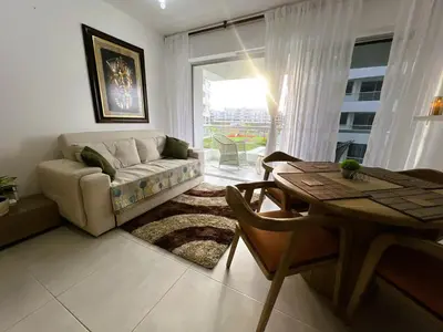 a living room with a couch and a table at Serenity Flat in Puerto Tierrabaja