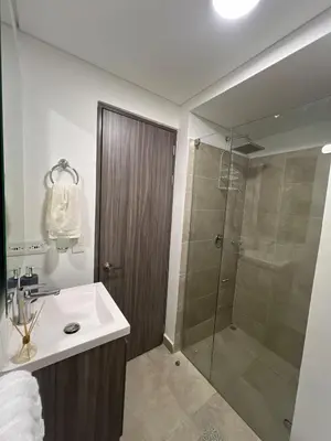 a bathroom with a shower and a sink and a shower stall at cartagena apto castelo serena del mar in Puerto Tierrabaja