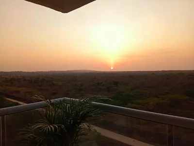 a sunset seen from the balcony of a resort at cartagena apto castelo serena del mar in Puerto Tierrabaja