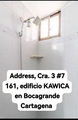a bathroom with a shower with a window at Habitaciones cerca playa Bocagrande in Cartagena de Indias