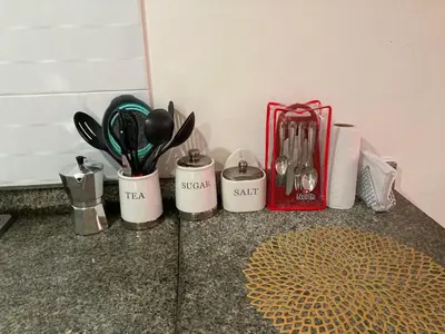 a counter with three cups and utensils on it at Turipaná 209 in Cartagena de Indias