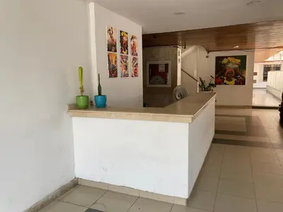 a kitchen with a white counter in a room at Turipaná 209 in Cartagena de Indias