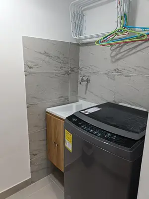 a kitchen with a stove and a counter top at Torre 811 in Cartagena de Indias
