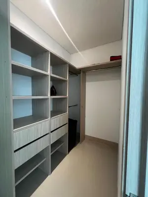 a walk in closet with shelves in a room at Apartamento Palmar in Cartagena de Indias