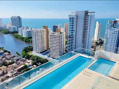 an apartment with a swimming pool on the roof of a building at Aqualina 911 in Cartagena de Indias