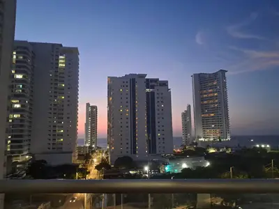 a city skyline with tall buildings at night at Aqualina 911 in Cartagena de Indias