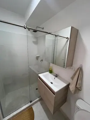 a bathroom with a shower and a sink and a toilet at Apartamento en Cartagena in Cartagena de Indias