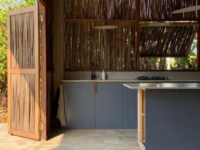 a kitchen with a sink and a counter top at Serenity Home in San Bernardo del Viento