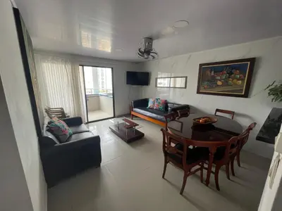 a living room with a couch and a table at Vista Hermosa Portofino in Cartagena de Indias