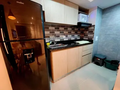 a kitchen with a stainless steel refrigerator and a sink at New and with an ocean view in Cartagena de Indias