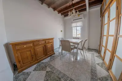 a dining room with a table and chairs at Cozy apartment in the old city 421 in Cartagena de Indias