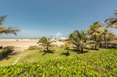 a view of a beach with palm trees at Edificio Morros Vitri, 2 Bedrooms- Comfy Apartment in Cartagena de Indias