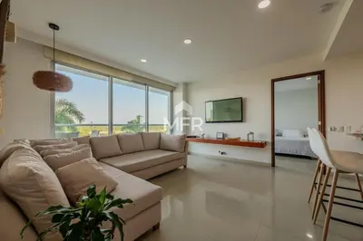 a living room with a couch and a table at Edificio Morros Vitri, 2 Bedrooms- Comfy Apartment in Cartagena de Indias