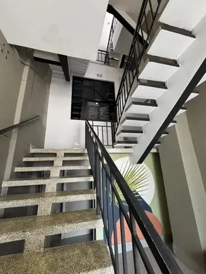 a spiral staircase in a building with a stair railing at Espectacular Apartamento Amoblado - 2 Habitaciones in Barranquilla