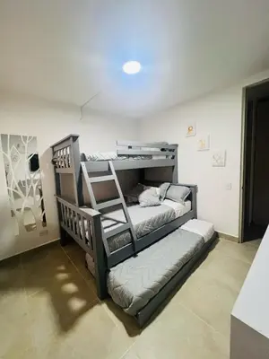 a bedroom with two bunk beds in a room at Apartamento Descanso Cartagena in Manzanillo del Mar
