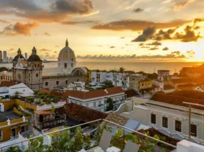 a view of a city at sunset at Cabrero Beach 1008 in Cartagena de Indias