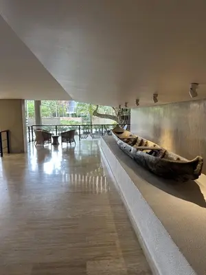 a museum with a large wooden boat on the wall at Martinique 1001 luxure escape & comfort in Cartagena de Indias