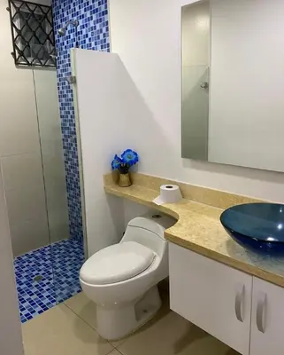a bathroom with a toilet and a sink and a shower at Inolvidables atardeceres en Cartagena in Cartagena de Indias