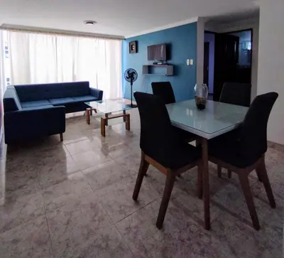 a living room with a table and chairs and a couch at PrinSha#2 in Cartagena de Indias