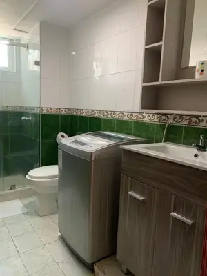 a bathroom with a toilet and a sink and a shower at PrinSha#2 in Cartagena de Indias