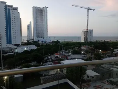 a view of a city with tall buildings and a crane at aqualina911 in Cartagena de Indias