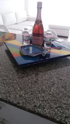 a table with a bottle of alcohol and drinks on it at Morros Epic Cartagena in Cartagena de Indias