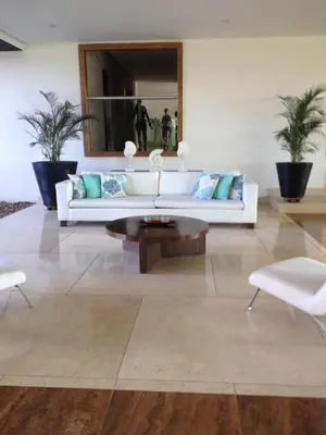 a living room with a white couch and a coffee table at Morros Epic Cartagena in Cartagena de Indias